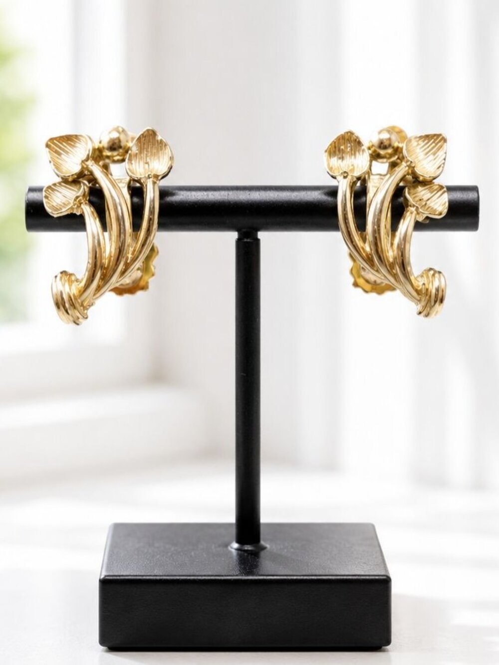 Vintage Gold-Tone Clip-On Leaf Motif Earrings With Textured Design